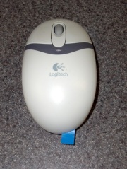 Mouse with battery disconnected and tabbed