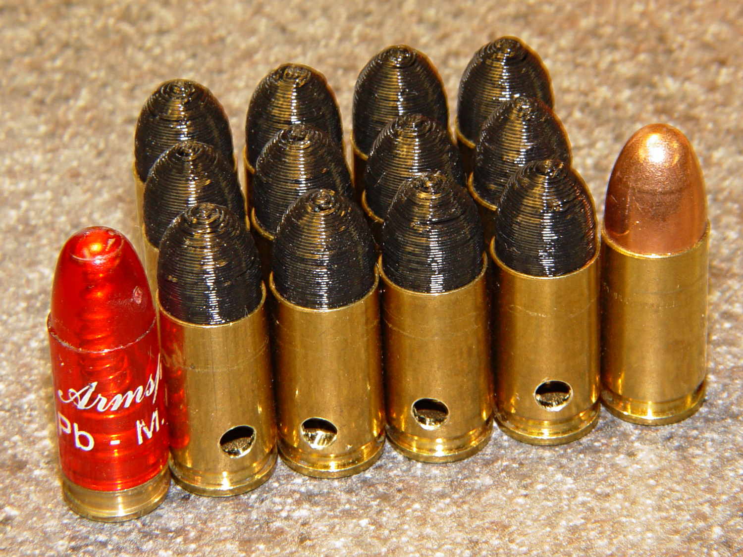 Dummy 9 mm Luger cartridges.