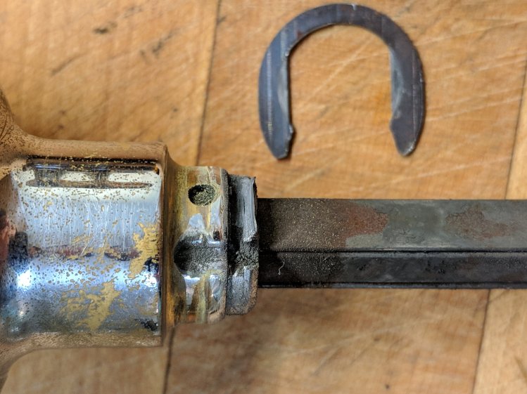 Doorknob shaft - worn retaining flange